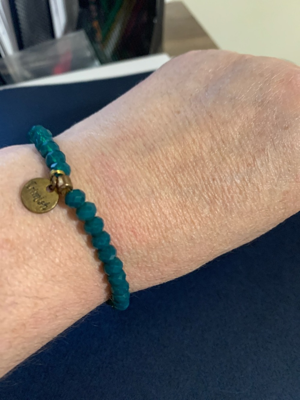 Teal Faceted Bead Stretch Bracelet with Gold Accent Charm